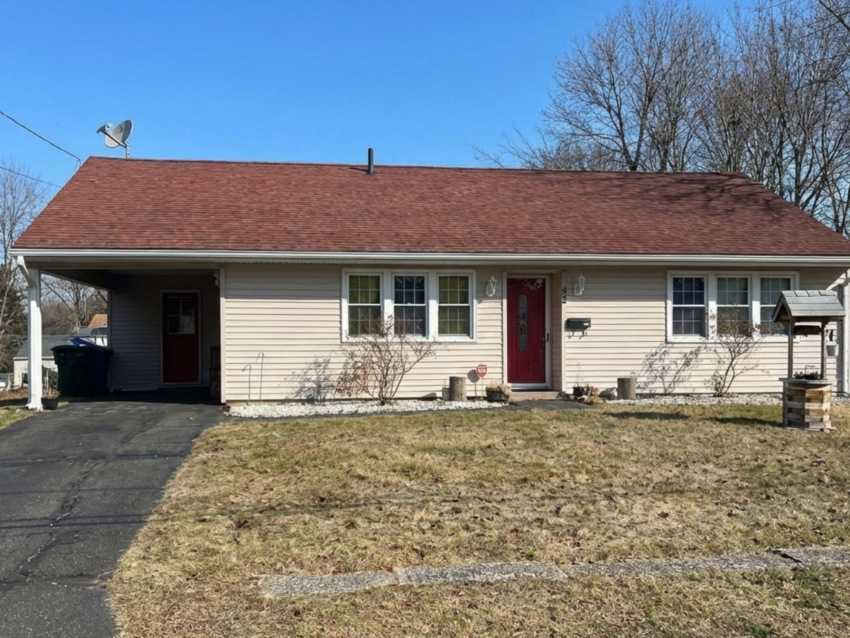 After: Summer view of a East Hartford, CT home with new Owens Corning Duration Shingles — clean lines, durable protection, and timeless curb appeal