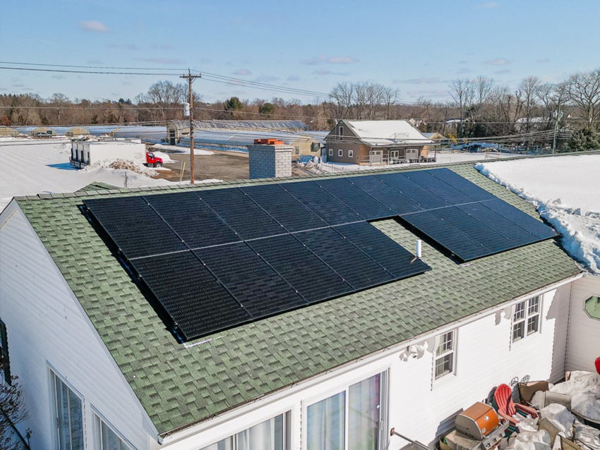 Bifacial solar panels Connecticut — light roof shingles boost energy production with reflected light